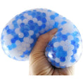 Load image into Gallery viewer, Hand squeezing a DIY Stress Ball Kit filled with colorful water beads for stress relief.