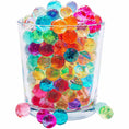 Load image into Gallery viewer, Cosmo Beads Multi-Color Water Beads in a glass cup showcasing vibrant colors and glossy, translucent spheres.