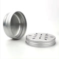 Load image into Gallery viewer, Clear PET Jars with Perforated Aluminum Lids close-up view of perforated aluminum caps.
