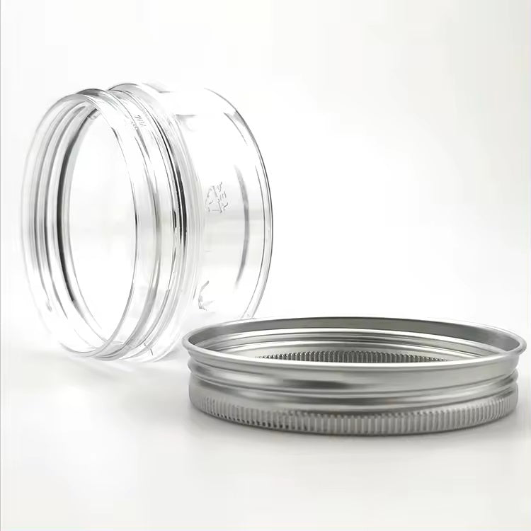 Clear PET Jars with Perforated Aluminum Lids side view of jar and detached lid.