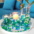 Load image into Gallery viewer, Ocean-inspired decorative water gel beads in mixed blue, turquoise, and white colors for home decor vase fillers and event centerpieces.

