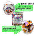 Load image into Gallery viewer, Cosmo Beads Multi-Color Water Beads instructions showing how to soak and drain for use in decorative projects.
