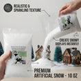 Load image into Gallery viewer, Pouring sparkling artificial snow onto a miniature winter village display with miniature houses and pine trees.
