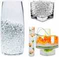 Load image into Gallery viewer, Sleek and glossy Transparent Water Gel Beads used as a crystal-clear decorative solution for a modern glass vase display.
