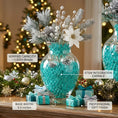Load image into Gallery viewer, An infographic-style photo of a clear glass Christmas centerpiece vase filled with vibrant turquoise water beads, white poinsettias, and silver pine boughs on a mantel. The image includes text callouts: 'VERIFIED CAPACITY: ~3,000+ Beads', 'STEM INTEGRATION CAPABLE', 'BASE WIDTH: 5.5 inches', and 'PROFESSIONAL GIFT FINISH'. Blue and silver gift boxes surround the vase against a background of a lit Christmas tree and fireplace.
